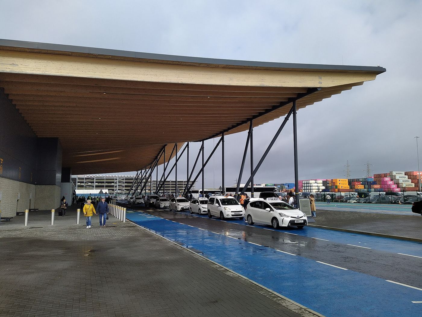 Cars queueing in the covered drop-off lane at Horizon Cruise Terminal, Southampton
