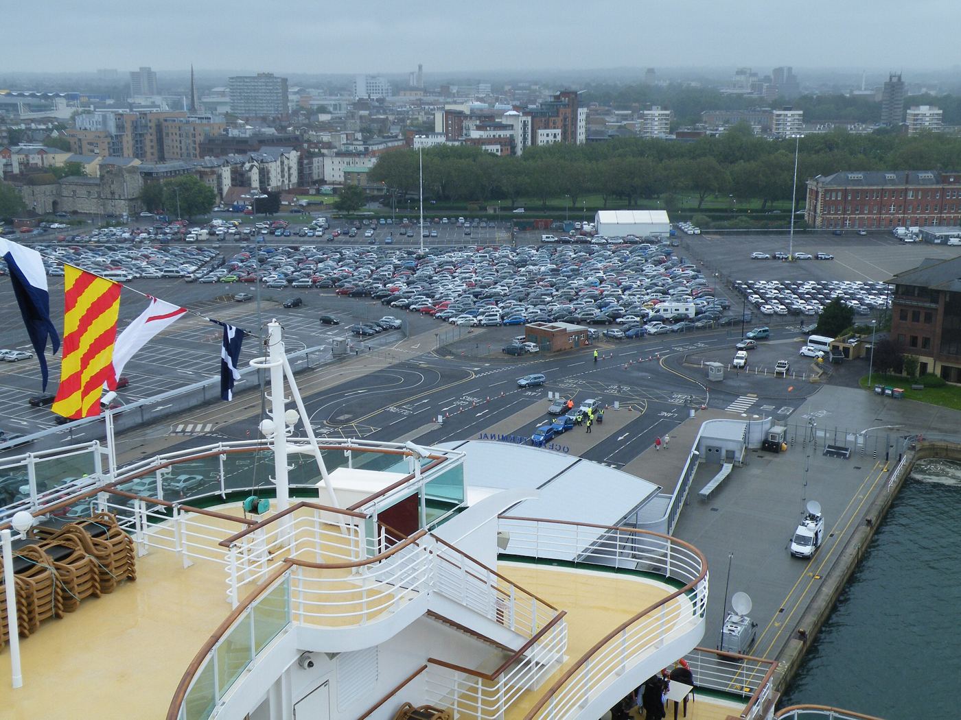 The arrival area and car parks at Ocean Cruise Terminal viewed from P&O Azura